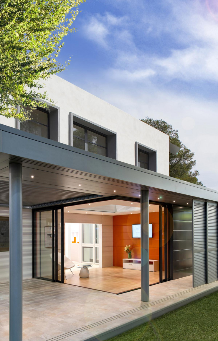 Extensk est à la pointe en matière de consommation d’énergie avec ce modèle bioclimatique en aluminium incluant une pergola, Vérancial.