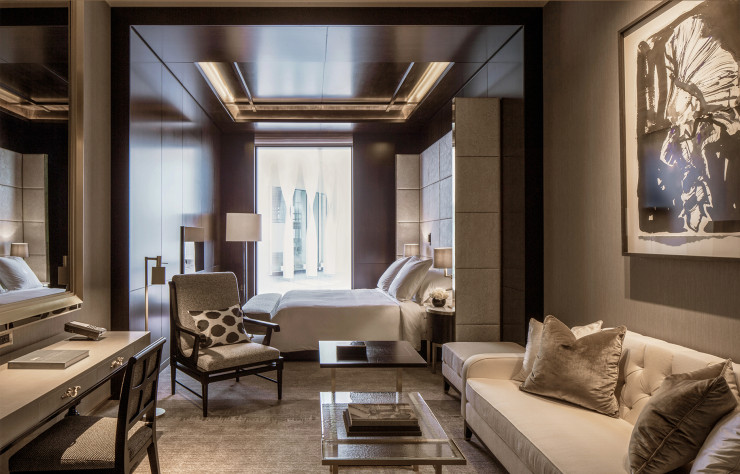 Une Executive Room, avec son coin salon et la vue sur cour intérieur.