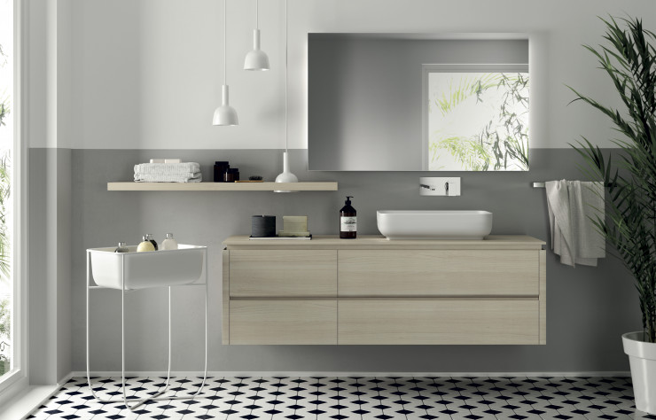 Meubles bas suspendus revêtus de mélaminé Orme Kuuki et lavabo en Cristalplant. Plan en stratifié Orme Kuuki.