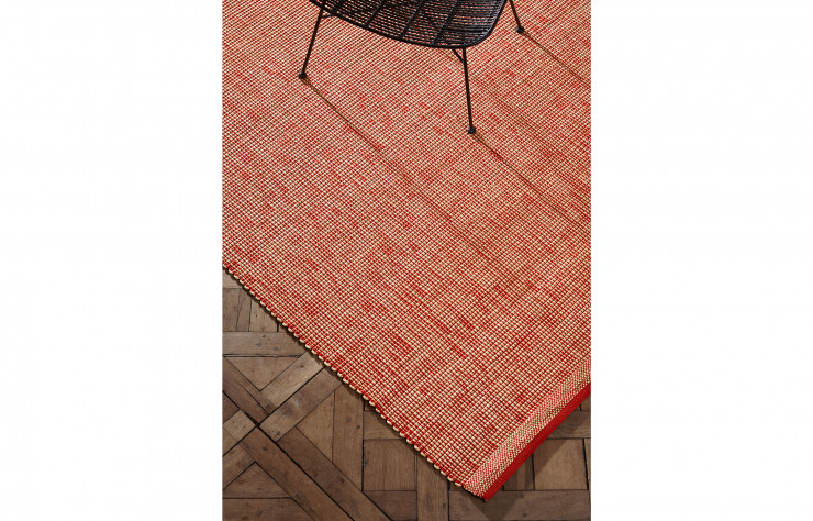 Tapis en raphia de la collection « Binaire » (La Manufacture Cogolin).