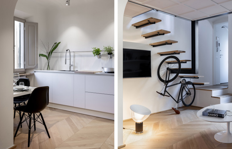 Les assises des Eames et le piétement en aluminium de la lampe « Taccia » ponctuent l’espace de noir tout en rappelant la structure métallique de la mezzanine et de l’escalier.