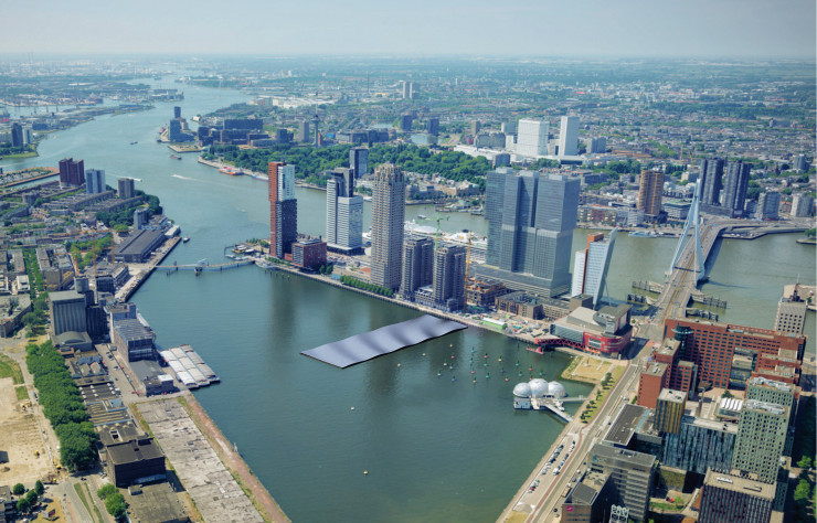 Baptisé SolarPark, le projet s’inscrit dans la rénovation urbaine des quartiers de Kop van Zuid (à droite) et Katendrect (à gauche), situés de part et d’autres du bassin de Rinjhaven.