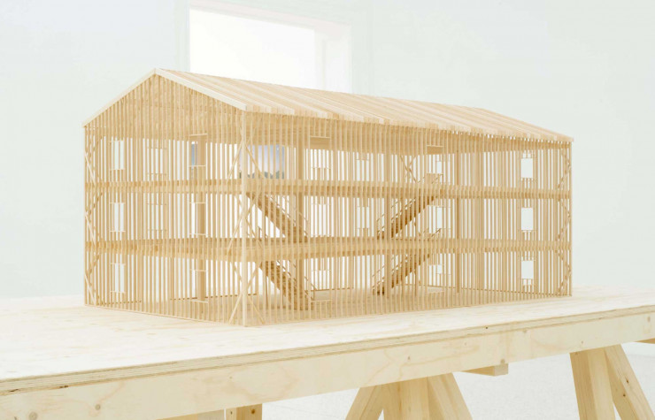 Maquette de maison à ossature bois dans le pavillon US.