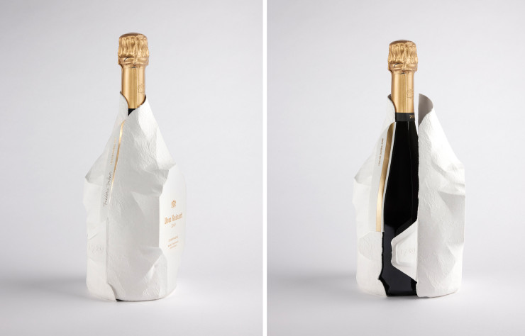 Il porte en lui plusieurs messages : composé à 99 % de papier recyclable, il est le fruit d’une démarche d’écoconception ; il représente en outre l’association du divin breuvage avec un terroir (une production vinicole sur un sol crayeux), où les anciennes carrières de craie (les crayères) servent désormais de caves de conservation et de vieillissement et figurent sur la Liste du patrimoine mondial.